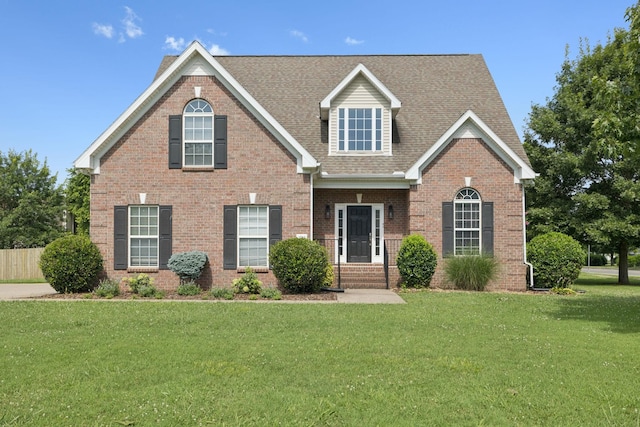 1704 Satterfield Ct, Murfreesboro, TN 37128 - view of front facade featuring brick siding, a front lawn, and roof with shingles