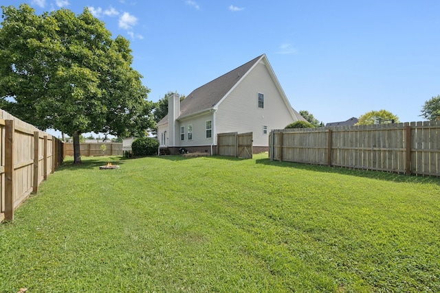 1704 Satterfield Ct, Murfreesboro, TN 37128 - fenced backyard with a fire pit