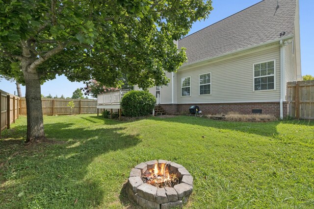 1704 Satterfield Ct, Murfreesboro, TN 37128 - fenced backyard with a fire pit
