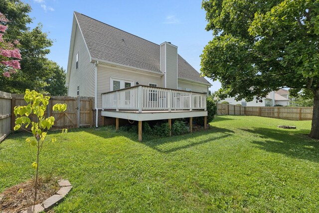 1704 Satterfield Ct, Murfreesboro, TN 37128 - back of house featuring a deck, roof with shingles, a fenced backyard, and a chimney