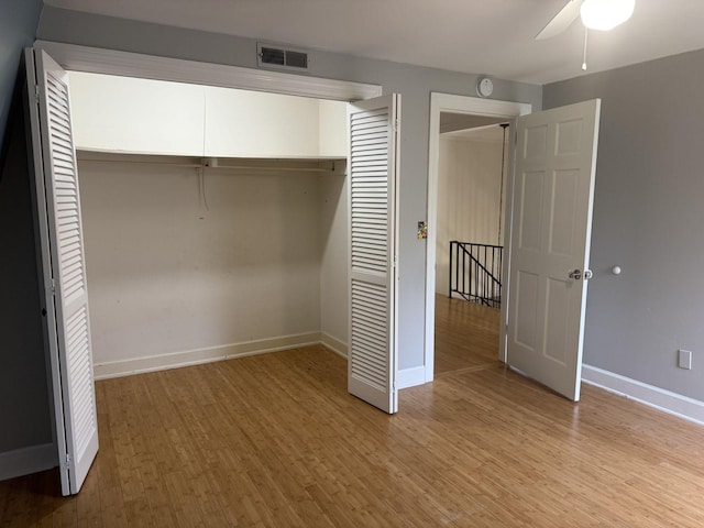 236 N Carolina Ave, Sewanee, TN 37375 - unfurnished bedroom with a closet, light wood finished floors, and ceiling fan