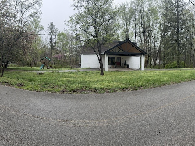236 N Carolina Ave, Sewanee, TN 37375 - view of side of property featuring a playground and a lawn