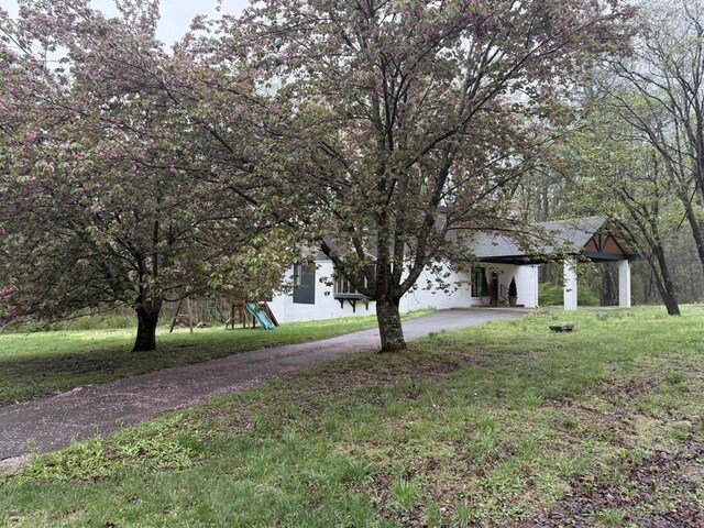 236 N Carolina Ave, Sewanee, TN 37375 - view of front of home featuring a carport and driveway