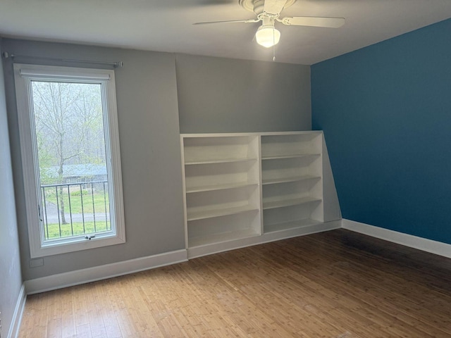 236 N Carolina Ave, Sewanee, TN 37375 - empty room featuring wood finished floors, healthy amount of natural light, and ceiling fan