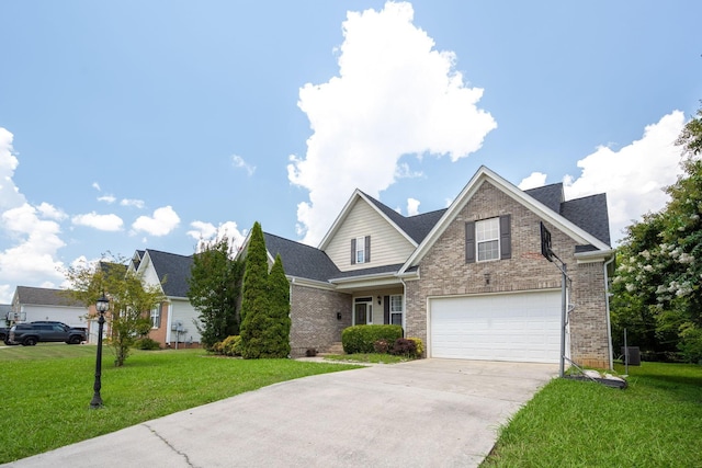 6853 Manassas Gap Ln, Hixson, TN 37343 - traditional-style home featuring brick siding, driveway, a front yard, and a garage