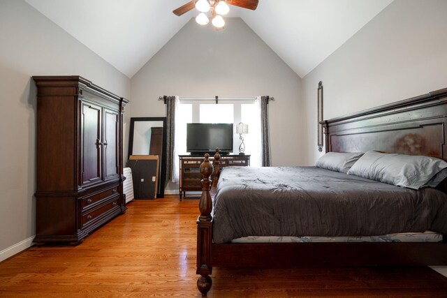 6853 Manassas Gap Ln, Hixson, TN 37343 - bedroom featuring high vaulted ceiling, light wood-style floors, and a ceiling fan
