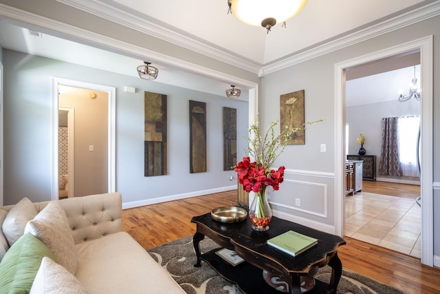 6853 Manassas Gap Ln, Hixson, TN 37343 - living room featuring ornamental molding and light wood finished floors