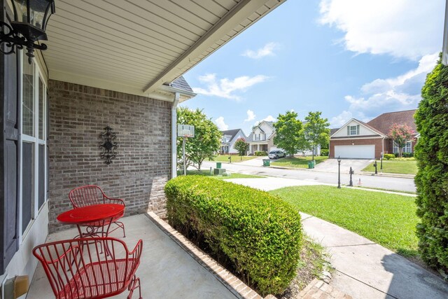 6853 Manassas Gap Ln, Hixson, TN 37343 - view of patio / terrace featuring a residential view and driveway