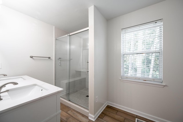 270 Autumn Trl, Ringgold, GA 30736 - bathroom featuring a shower stall, wood finished floors, and double vanity