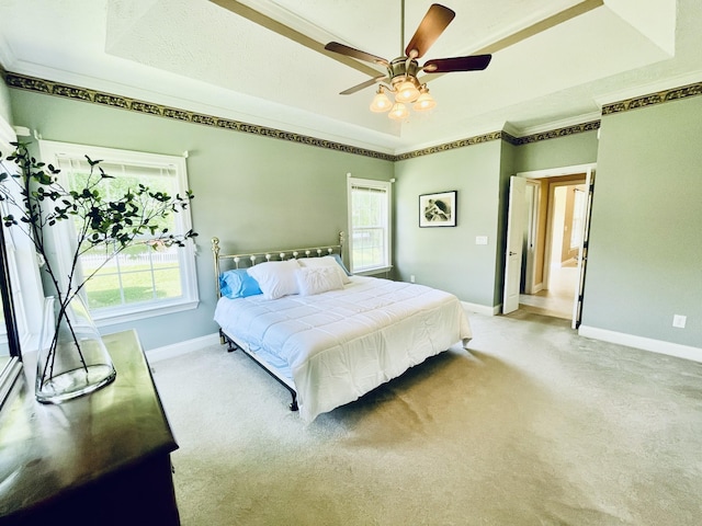 2714 Maylon Dr, Murfreesboro, TN 37128 - bedroom featuring carpet, ornamental molding, multiple windows, a tray ceiling, and ceiling fan