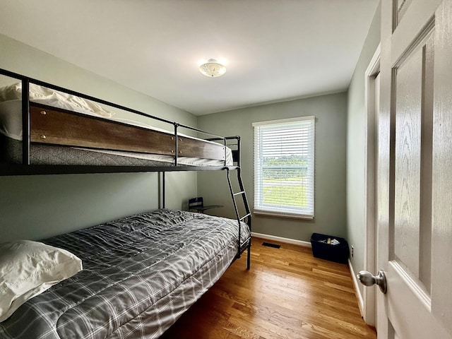 465 Turtle Point Ln, Waverly, TN 37185 - bedroom featuring wood finished floors and baseboards