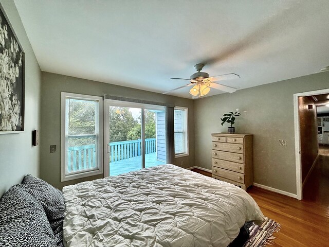 465 Turtle Point Ln, Waverly, TN 37185 - bedroom with access to exterior, wood finished floors, and a ceiling fan