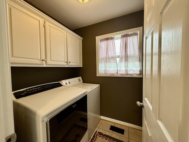 465 Turtle Point Ln, Waverly, TN 37185 - laundry area with washing machine and dryer, cabinet space, and light tile patterned floors