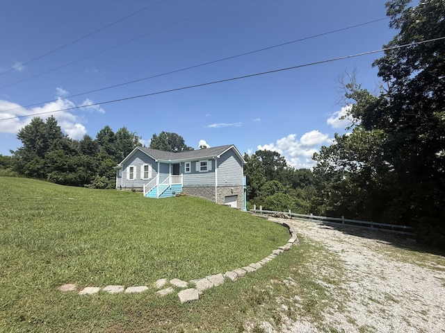 465 Turtle Point Ln, Waverly, TN 37185 - ranch-style home with an attached garage and stone siding