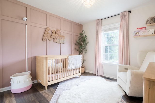 108 Larry Joe Pl, Portland, TN 37148 - bedroom featuring a nursery area and wood finished floors