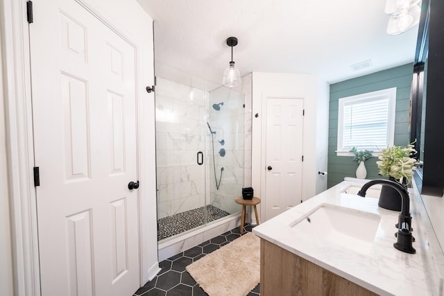 108 Larry Joe Pl, Portland, TN 37148 - bathroom with a shower stall, double vanity, and tile patterned floors