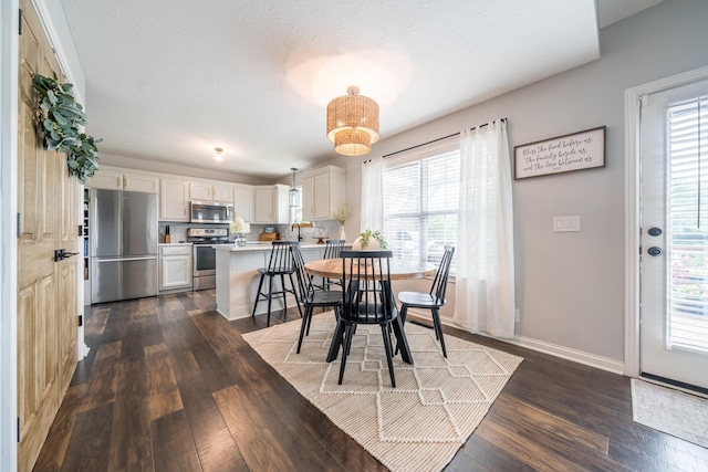 108 Larry Joe Pl, Portland, TN 37148 - dining area with plenty of natural light and dark wood-type flooring