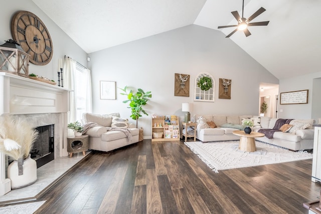 108 Larry Joe Pl, Portland, TN 37148 - living area with high vaulted ceiling, wood finished floors, ceiling fan, and a fireplace