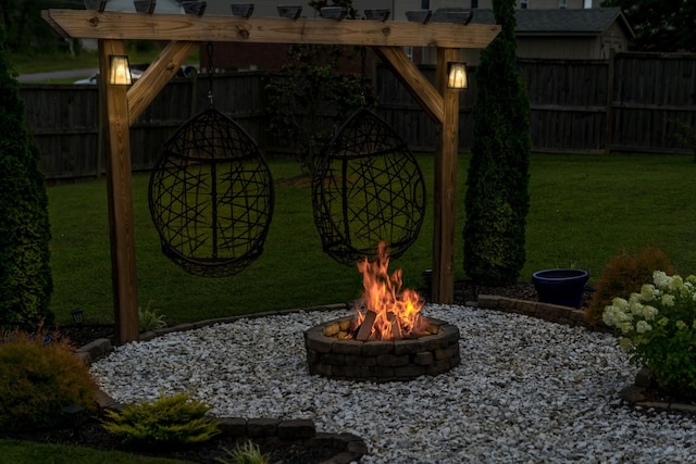 108 Larry Joe Pl, Portland, TN 37148 - fenced backyard featuring a fire pit and a pergola
