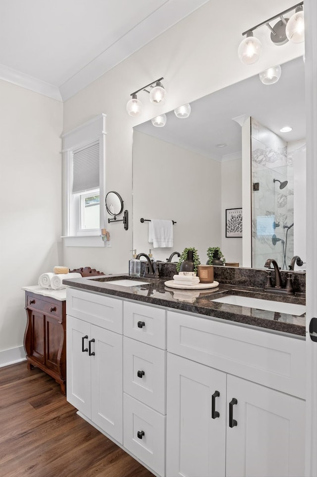 3767 Lee Pike, Soddy Daisy, TN 37379 - full bathroom with crown molding, a stall shower, double vanity, and wood finished floors