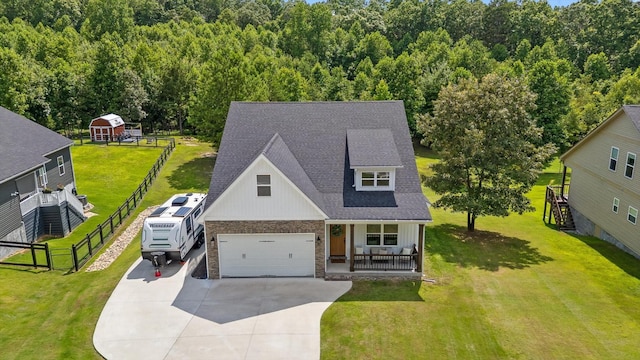 3767 Lee Pike, Soddy Daisy, TN 37379 - view of front of home featuring covered porch, stone siding, driveway, a shingled roof, and board and batten siding