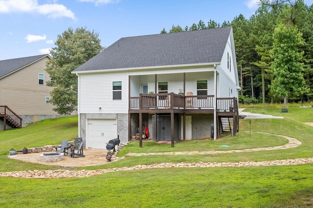3767 Lee Pike, Soddy Daisy, TN 37379 - rear view of property with an outdoor fire pit, stairs, a wooden deck, a garage, and a yard