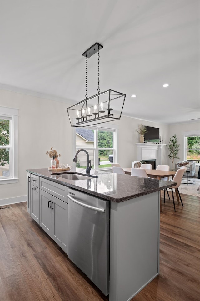 3767 Lee Pike, Soddy Daisy, TN 37379 - kitchen featuring dishwasher, an island with sink, dark wood-style flooring, dark stone counters, and ornamental molding