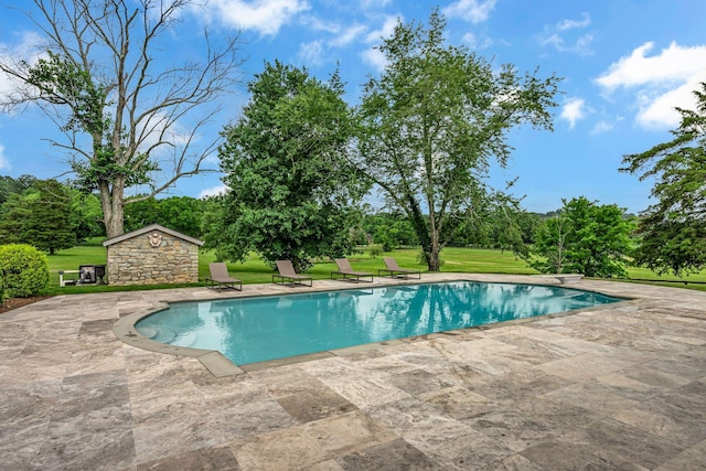 2485 Old Natchez Trce, Franklin, TN 37069 - swimming pool with a patio area, a yard, an outbuilding, and view of scattered trees
