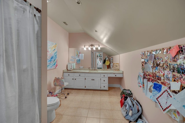 2485 Old Natchez Trce, Franklin, TN 37069 - bathroom featuring lofted ceiling, vanity, a shower with curtain, and tile patterned flooring