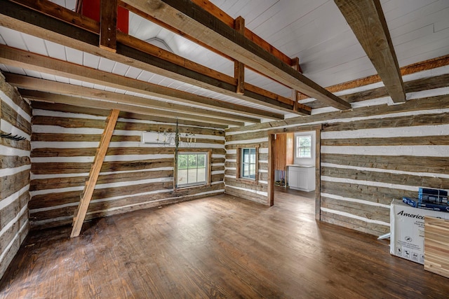 2485 Old Natchez Trce, Franklin, TN 37069 - unfurnished living room featuring wooden walls and dark wood-style flooring