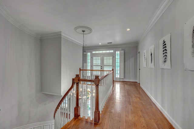 2485 Old Natchez Trce, Franklin, TN 37069 - hall featuring an upstairs landing, wood finished floors, and crown molding