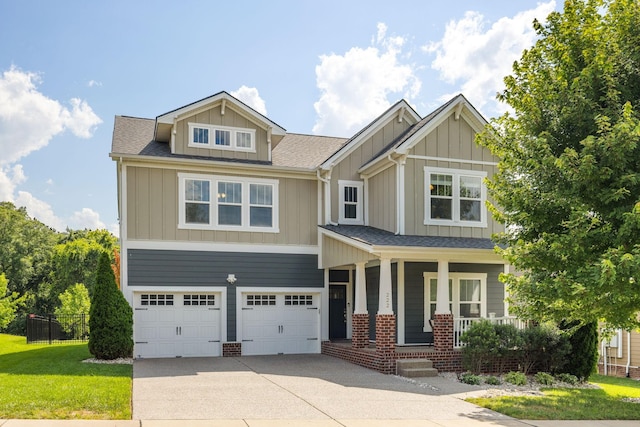 222 Fowler Cir, Franklin, TN 37064 - craftsman inspired home featuring board and batten siding, covered porch, an attached garage, and concrete driveway