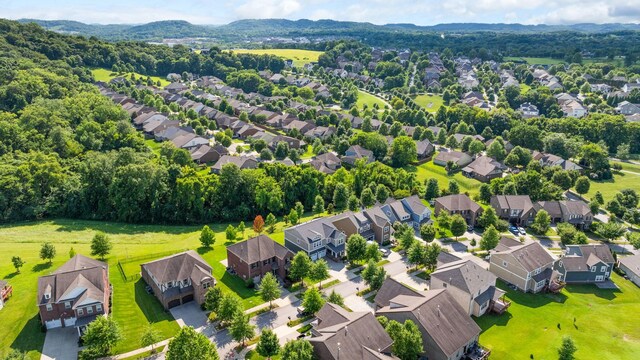 222 Fowler Cir, Franklin, TN 37064 - aerial view of residential area featuring a mountainous background