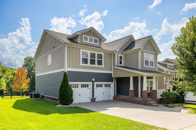222 Fowler Cir, Franklin, TN 37064 - craftsman house featuring covered porch, an attached garage, board and batten siding, concrete driveway, and roof with shingles