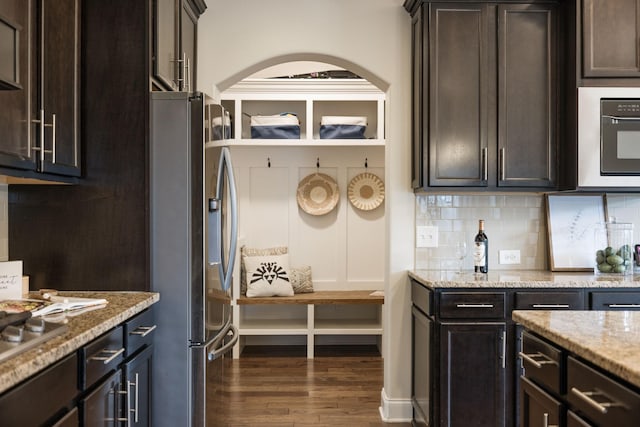 222 Fowler Cir, Franklin, TN 37064 - kitchen with stainless steel refrigerator with ice dispenser, wood finished floors, and dark brown cabinetry