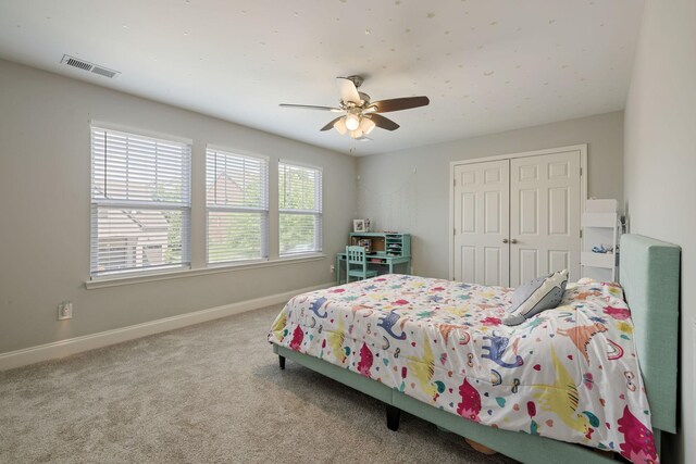222 Fowler Cir, Franklin, TN 37064 - carpeted bedroom featuring a closet and ceiling fan