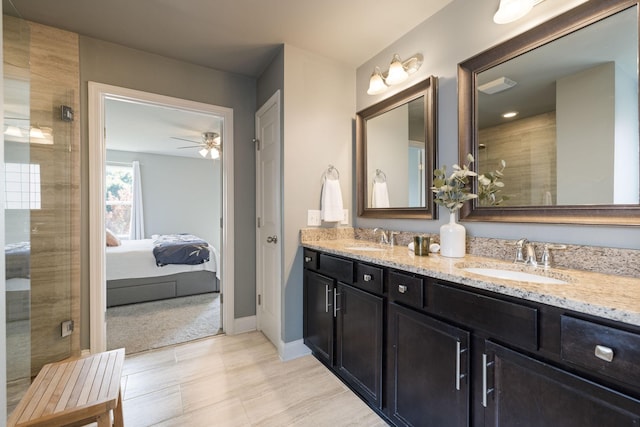 222 Fowler Cir, Franklin, TN 37064 - ensuite bathroom with double vanity, a shower stall, and ceiling fan