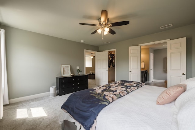 222 Fowler Cir, Franklin, TN 37064 - bedroom with carpet flooring, a spacious closet, and ceiling fan