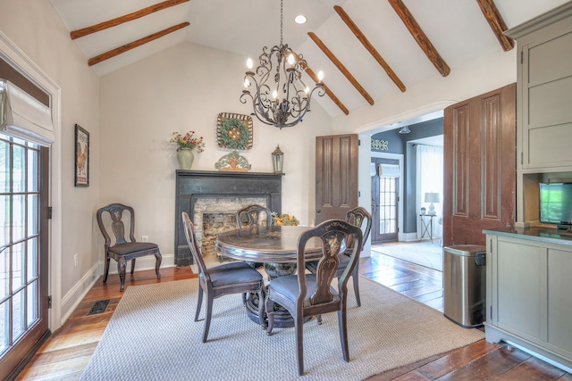9710 Concord Rd, Brentwood, TN 37027 - dining area featuring healthy amount of natural light, hardwood / wood-style flooring, a stone fireplace, high vaulted ceiling, and beamed ceiling