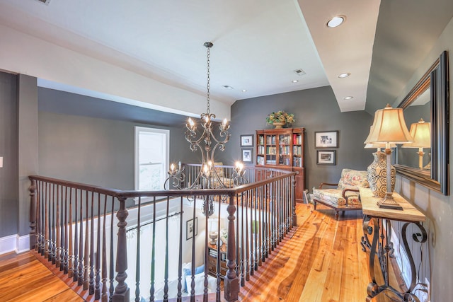 9710 Concord Rd, Brentwood, TN 37027 - hall with hardwood / wood-style floors, a chandelier, an upstairs landing, and recessed lighting