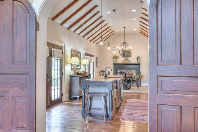 9710 Concord Rd, Brentwood, TN 37027 - foyer featuring wood-type flooring, arched walkways, a chandelier, and recessed lighting