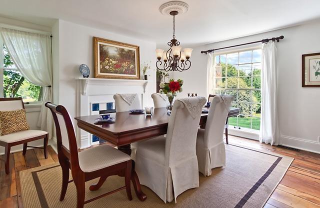 9710 Concord Rd, Brentwood, TN 37027 - dining area with a chandelier and light wood-style floors