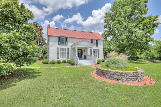 9710 Concord Rd, Brentwood, TN 37027 - view of front of house featuring a metal roof, a chimney, and a porch