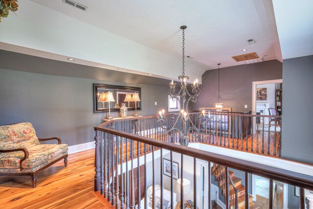 9710 Concord Rd, Brentwood, TN 37027 - corridor featuring an upstairs landing, a chandelier, wood finished floors, vaulted ceiling, and recessed lighting