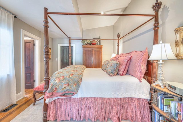 9710 Concord Rd, Brentwood, TN 37027 - bedroom with wood finished floors and vaulted ceiling