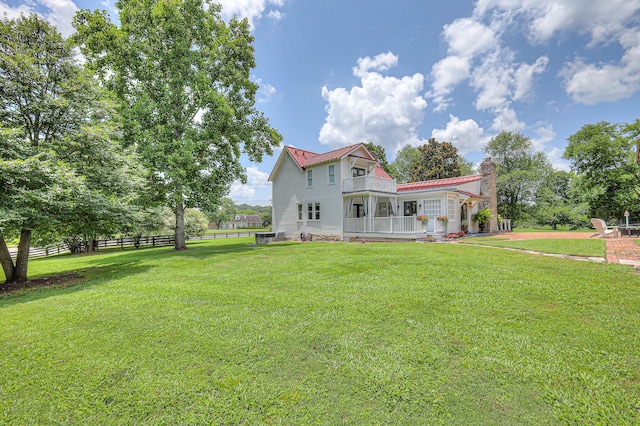 9710 Concord Rd, Brentwood, TN 37027 - back of property with a chimney, a balcony, a metal roof, and a porch
