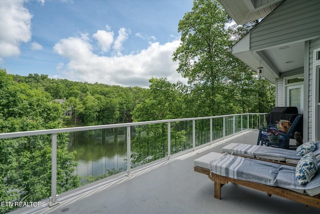 145 Pineridge Loop, Crossville, TN 38558 - balcony with a grill and a view of trees