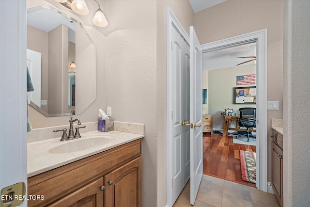 145 Pineridge Loop, Crossville, TN 38558 - bathroom with vanity, tile patterned flooring, and a textured wall
