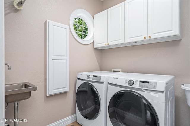 145 Pineridge Loop, Crossville, TN 38558 - laundry room featuring cabinet space and washing machine and clothes dryer