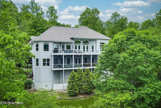 145 Pineridge Loop, Crossville, TN 38558 - rear view of house with a balcony and roof with shingles